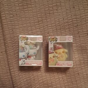 Funko Cinnamoroll and Pompompurin Figures - Blue and Yellow